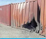  ?? — AFP ?? TRIPOLI: A damaged container is pictured at a port in Libya’s capital Tripoli after it was hit by rocket fire.