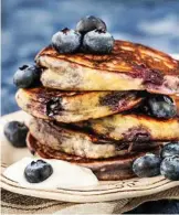  ?? PHOTO: 123RF ?? Spoil your mum with these fluffy ricotta and blueberry pancakes.