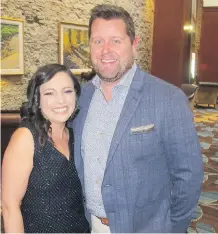  ??  ?? Michael MacLean of Shane Homes and Anna Kaufman from Sterling Homes-A Qualico Group attended 30th annual SAM Awards, where 78 finalists were selected from more than 800 entries to compete for 60 awards to be presented. The event is the equivalent to...