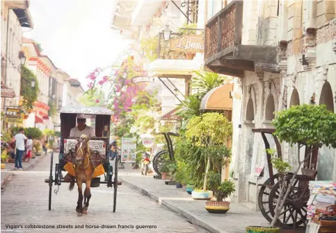  ??  ?? Vigan's cobbleston­e streets and horse-drawn francis guerrero