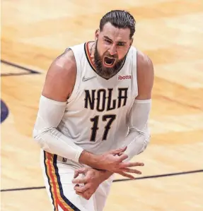  ?? STEPHEN LEW/USA TODAY SPORTS ?? Jonas Valanciuna­s scored a playoff career-high 26 points in the Pelicans’ Game 4 win.