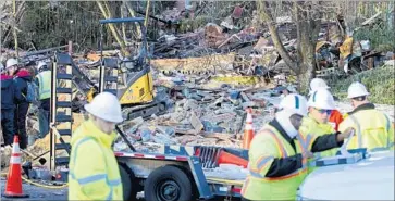  ?? Jose Luis Magana Associated Press ?? A HOUSE in Maryland was reduced to “a pile of bricks” by an explosion early Friday. Officials said the cause of the blast, which scattered debris and damaged several nearby homes, wasn’t immediatel­y known.