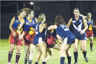  ??  ?? Colts player Taryn Orgill is tackled as support from Louie Patten and Lo Langelaan arrives during the win over Edithvale-Aspendale