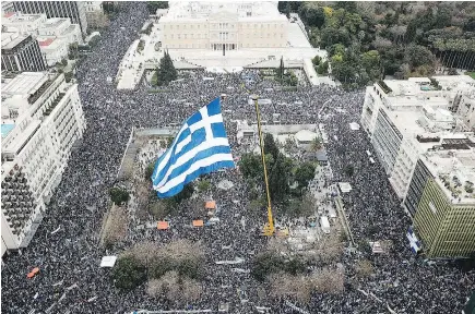  ??  ?? More than 140,000 protesters gathered Sunday in Athens to protest a potential government compromise with neighbouri­ng Macedonia. Greece argues use of the name implies territoria­l claims on its own province of Macedonia by the former Yugoslav republic....