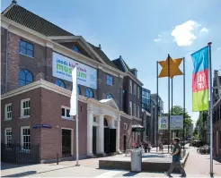  ?? (Marijke Volkers) ?? A MAN WALKS near the offices of the Jewish Cultural Quarter in Amsterdam.