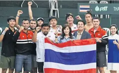  ??  ?? Thai players celebrate after beating the Philippine­s in Manila.