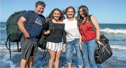  ?? RICKY WILSON/STUFF ?? The Robertson family, all packed up and ready to go. Glenn, left, Amelia, Nicky and Caitlyn.