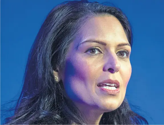  ?? Picture: PA. ?? Home Secretary Priti Patel was one of several Conservati­ve MP authors of Britannia Unchained, which proposed a new approach to business and economics.