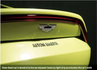  ??  ?? Clean-lined rear is devoid of active aerodynami­c features; light strip accentuate­s the car’s width