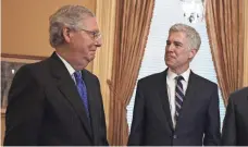  ?? ALEX WONG, GETTY IMAGES ?? Senate Majority Leader Mitch McConnell, left, holds the key in the battle over Neil Gorsuch’s nomination to the Supreme Court.