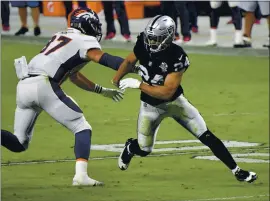  ?? JEFF BOTTARI — THE ASSOCIATED PRESS ?? Raiders strong safety Johnathan Abram, right, was fined $15,000 by the NFL, according to a source, for his actions during last Sunday’s game against the Denver Broncos.