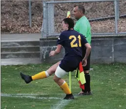  ?? PHOTO BY JOE LANGSTAFF ?? Mendocino College Eagles freshman Kiley Butler (21) takes a corner kick in the second half of the match vs. Merritt College on Nov. 14. The shot turned into an assist for Butler on the winning goal in the 87minute, the Eagles winning the match 2-1.