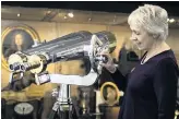  ??  ?? Militaria specialist Oonagh Drage with a pair of Japanese battleship binoculars