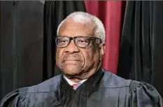  ?? J. Scott Applewhite / Associated Press ?? Supreme Court Justice Clarence Thomas was in his mid-40s and in his third year on the nation's highest court when he paid off the last of his debt from his time at Yale Law School.