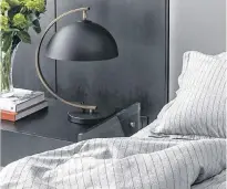  ?? ENVELLO.COM ?? Neutral deep grey sheets complement many existing bedding accessory colours in comforters, pillows and throws.