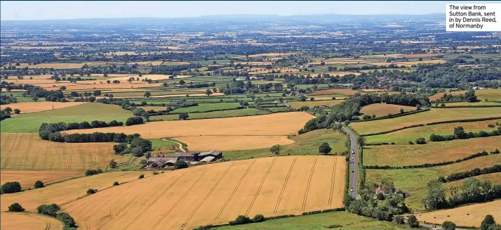  ?? SHOPPE from The yesterda plunged darknes
A num Middles bring th afterno
Not a but Boo the Pos closed
One go get devast Boots Road,
Nor power ?? The view from Sutton Bank, sent in by Dennis Reed, of Normanby