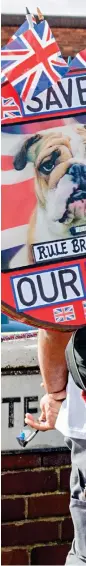  ??  ?? Patriotic: Protesters against the takeover outside the GKN Driveline factory in Erdington, Birmingham, this month