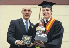  ?? CHRIS SAULNIER ?? Caleb Melanson received the D.A. Webber Trophy presented by Paul Veinotte. The trophy is awarded to two students — a female and a male — for excellence in academic subjects and athletics throughout their high school careers.