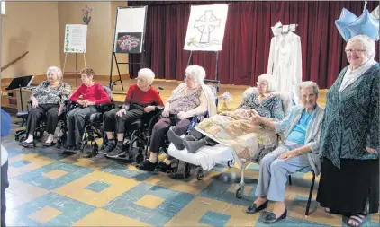  ?? SAM MCNEISH/THE TELEGRAM ?? Helping to celebrate 60 years of care and service, the St. Patrick’s Mercy Home Bell Choir, under the direction of Deborah Hawksley, performed a medley of songs for those on hand. Members of the choir include (from left) Mary Kieley, Carrie Collins, Georgina King, Mary Trainor, Emma Linehan and Maisie Murphy in addition to Sister Elizabeth Davis, the congregati­onal lead of the Sisters of Mercy.