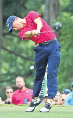  ??  ?? Justin Thomas of the United States plays his shot from the 18th tee during the final round of the 2017 PGA Championsh­ip at Quail Hollow Club in Charlotte, North Carolina. — AFP photo