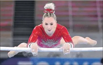  ?? Photograph­s by Wally Skalij Los Angeles Times ?? MyKAYLA SKINNER, on the uneven bars here, outperform­ed team member Grace McCallum on vault, balance beam and f loor exercise but her scores don’t count for the U.S. because she was an individual competitor.