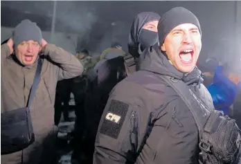  ?? Photos / AP ?? Ukrainians took to the streets of Kiev to protest outside the Russian embassy after the boats were seized.