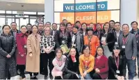  ??  ?? Staff and students from Macclesfie­ld College welcome visitors from China