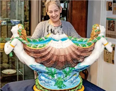  ?? ?? Left: Hansons’ ceramics consultant Gill Finney with the Minton majolica exhibition piece