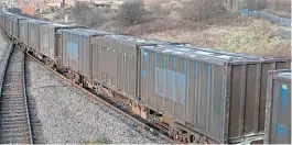  ??  ?? FCAs loaded with gypsum containers as modelled by Accurascal­e in ‘OO' gauge with No. 610247 nearest the camera. The train was heading north through Toton Yard when recorded on February 7, 2007.