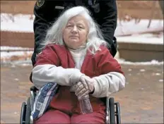  ?? Darrell Sapp/Post-Gazette ?? Martha Bell leaves the Allegheny County Courthouse on Thursday after pleading guilty before Common Pleas Judge David R. Cashman to charges she swindled a man in his 80s out of $322,000.