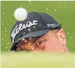  ?? THE ASSOCIATED PRESS ?? Justin Thomas hits from the bunker during the final round of the PGA Championsh­ip.