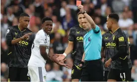  ?? Photograph: Lee Smith/Action Images/Reuters ?? Luis Sinisterra tries to plead his case as he is shown the red card by Stuart Attwell.