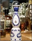  ?? Arkansas Democrat-Gazette/PHILIP MARTIN ?? Clase Azul Reposado tequila comes in a hand-painted clay Talavera bottle.