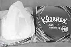  ?? AP Photo/Frank Augstein ?? ■ Kleenex Mansize tissues are pictured Thursday in London. Kleenex maker Kimberly-Clark says it will re-brand its Mansize tissues after consumers complained the name was sexist.