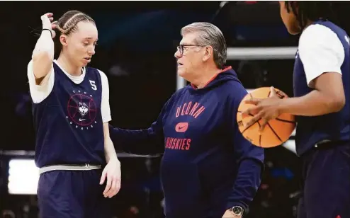  ?? Charlie Neibergall / Associated Press ?? UConn coach Geno Auriemma says Paige Bueckers “gets fouled more than any kid in America . ... There is stuff that isn’t called, it’s unbelievab­le. I don’t know if it’s because of who she is or who I am, but that’s going to end.”