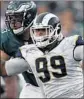  ?? Mark J. Terrill Associated Press ?? AARON DONALD (99), going against Philadelph­ia’s Lane Johnson, is holding Rams hostage.