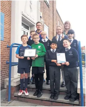  ??  ?? Award-winning pupils at Our Lady of Lourdes RC Primary School