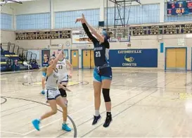  ?? CRAIG CLARY/STAFF ?? Mount de Sales junior Shelby Lewis shoots over Catonsvill­e’s Gianna Barracato in the Sailors’ 44-19 victory Saturday. Lewis had a game-high 10 points.