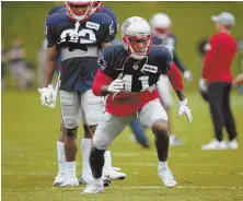  ?? STAFF FILE PHOTO BY NANCY LANE ?? SNAKEBIT: Cyrus Jones was cut yesterday by the Patriots, ending a disappoint­ing tenure done in by injury and fumbles.