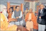  ?? HT PHOTO ?? Chhattisga­rh chief minister Raman Singh with CM Yogi Adityanath visits Gorakhnath temple on Monday.