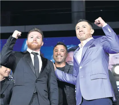  ??  ?? Saul Alvarez, left, and Gennady Golovkin, right, pose during a press conference last month.