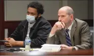  ?? MACOMB DAILY FILE PHOTO ?? Adrian Williamson, left, and his attorney, Ken Vernier, listen to testimony in March during Williamson’s preliminar­y examinatio­n in 41B District Court in Clinton Township for the death of Ross Richards.