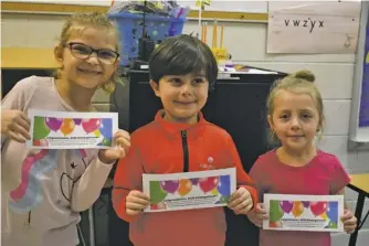  ?? PHOTOS BY HOLLY JENKINS ?? Pacey Williams, Roam Craig, and Brenlyn Phillips proudly display their certificat­es following the MyFuture activity