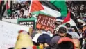  ?? — AFP file photo ?? Protesters lift placards and flags of Palestine during a demonstrat­ion in Rabat in solidarity with Palestinia­ns.