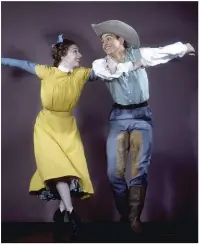  ??  ?? Power of two: (above left) Copland with Leonard Bernstein in 1945; (right) Agnes de Mille and Frederic Franklin in Copland’s ballet Rodeo, New York, 1942; (left) the poster for the 1949 film The Heiress