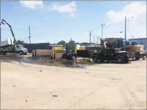  ?? Contribute­d photo ?? The pit at the Stamford transfer station on Harborview Avenue is designed to handle waste collected from storm drains has not functioned properly, so the waste has been left to dry in the parking area and driveways.