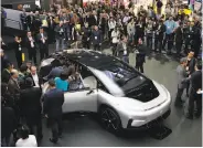  ?? Jae C. Hong / Associated Press ?? Faraday Future's FF 91 electric car is unveiled at CES Internatio­nal in Las Vegas in January.