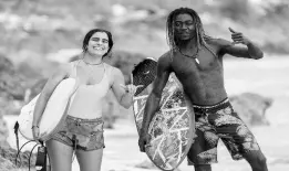  ?? ?? Brazilian surfer Vanessa Sarkis (left) and Boston, Portland surfing instructor Captain Keron ‘Jake’ Williams.