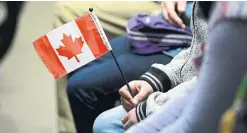  ?? SEAN KILPATRICK THE CANADIAN PRESS FILE PHOTO ?? Key findings of a new RBC Economics report include the fact that Canada added 34,000 permanent residents in the second quarter ending in June, representi­ng a 67 per cent drop compared with the same period last year.