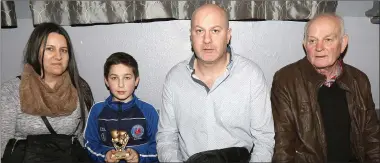  ??  ?? Jacinta Parle, Evan O’Leary, Anthony O’Leary and Anthony O’Leary at the Enniscorth­y Boxing Academy tournament.